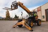 Chariot élévateur de chantier à portée variable Caterpillar TH 460 B