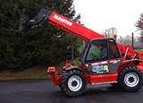 Chariot élévateur de chantier à portée variable Manitou MT 1435