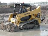 Chargeuse compacte sur chenilles Komatsu .