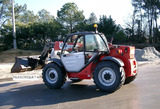 Chariot élévateur de chantier à portée variable Manitou MT 742