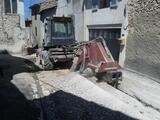 Trancheuse sur pneus Ditch Witch RT115 scie a rocher