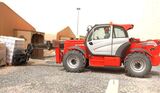 Chariot élévateur de chantier à portée variable Manitou MT 1440